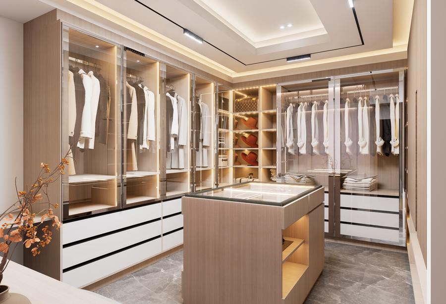 Closet com ilha central, gavetas e iluminação em LED